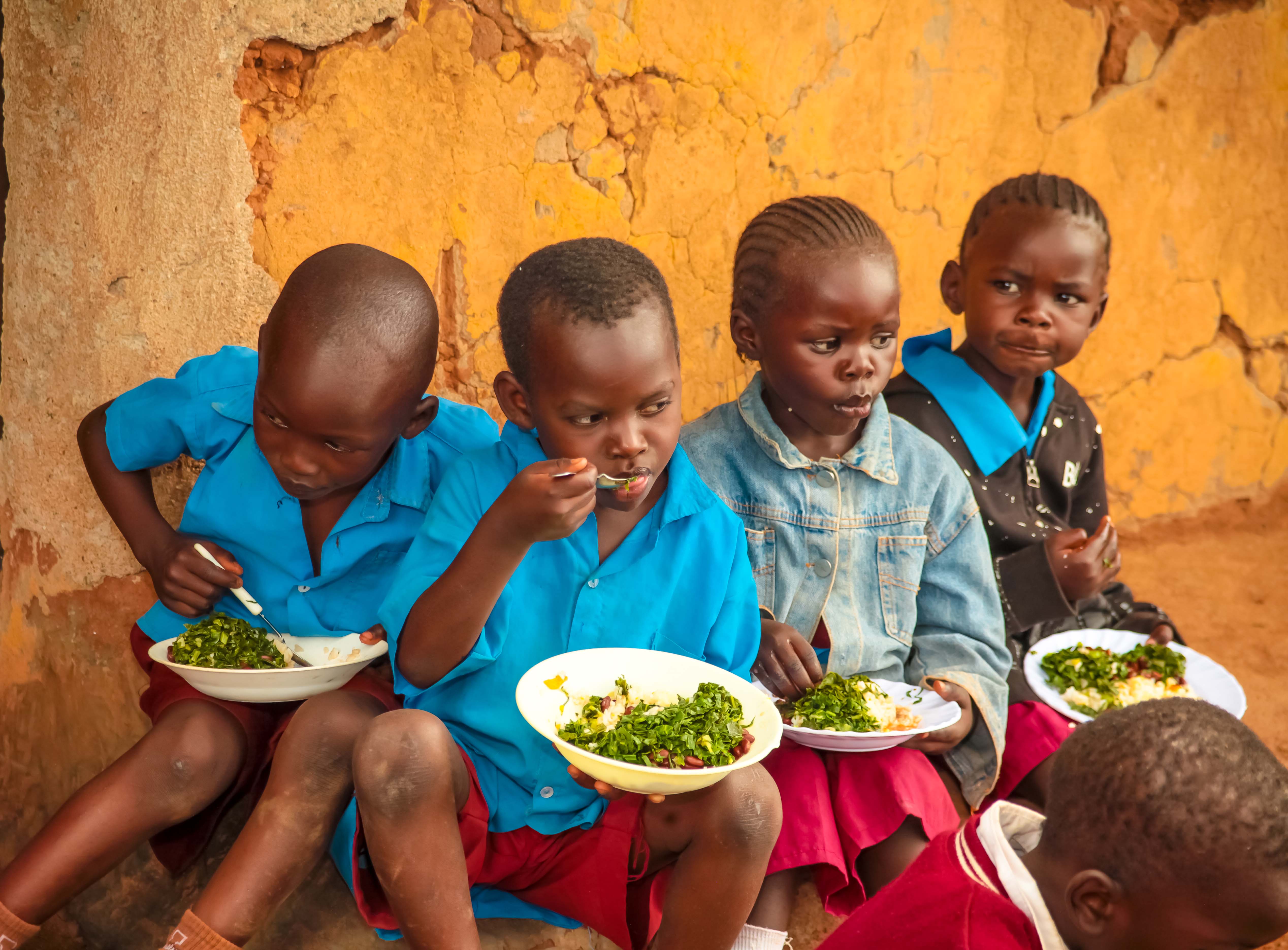 Students enjoying a school meal grown from the permaculture garden