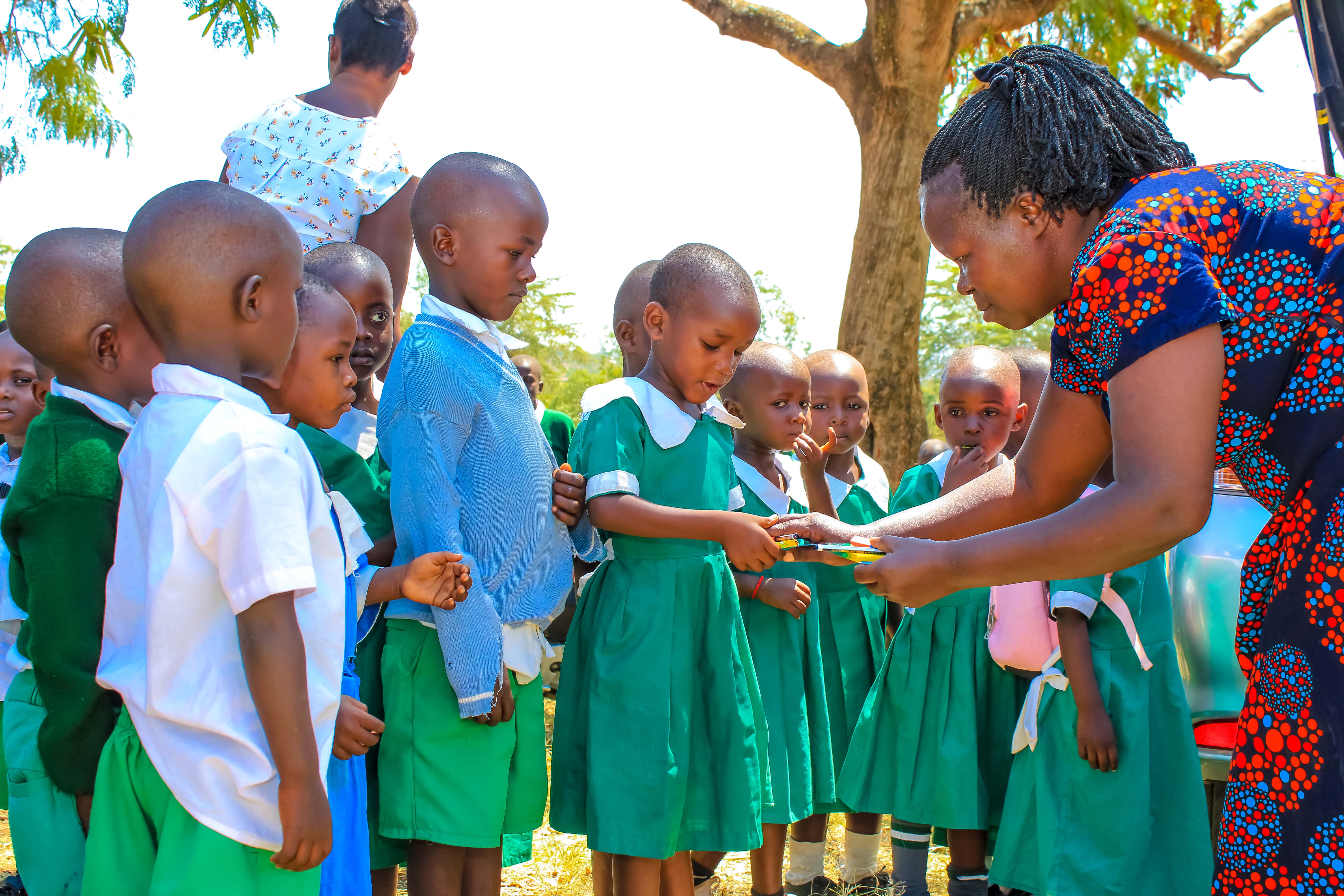 Students receiving stationery