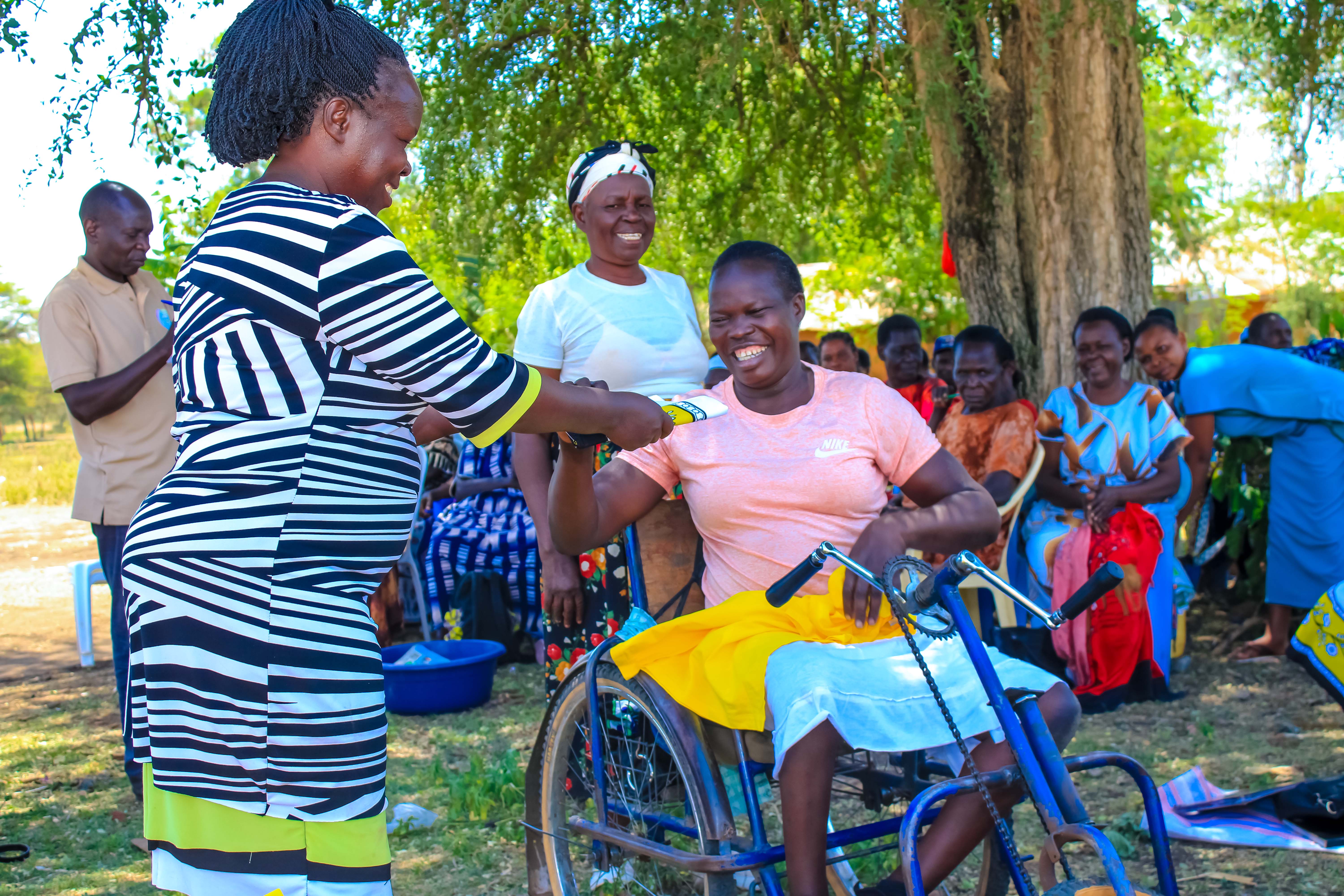 Kamanga women's group receiving t-shirts