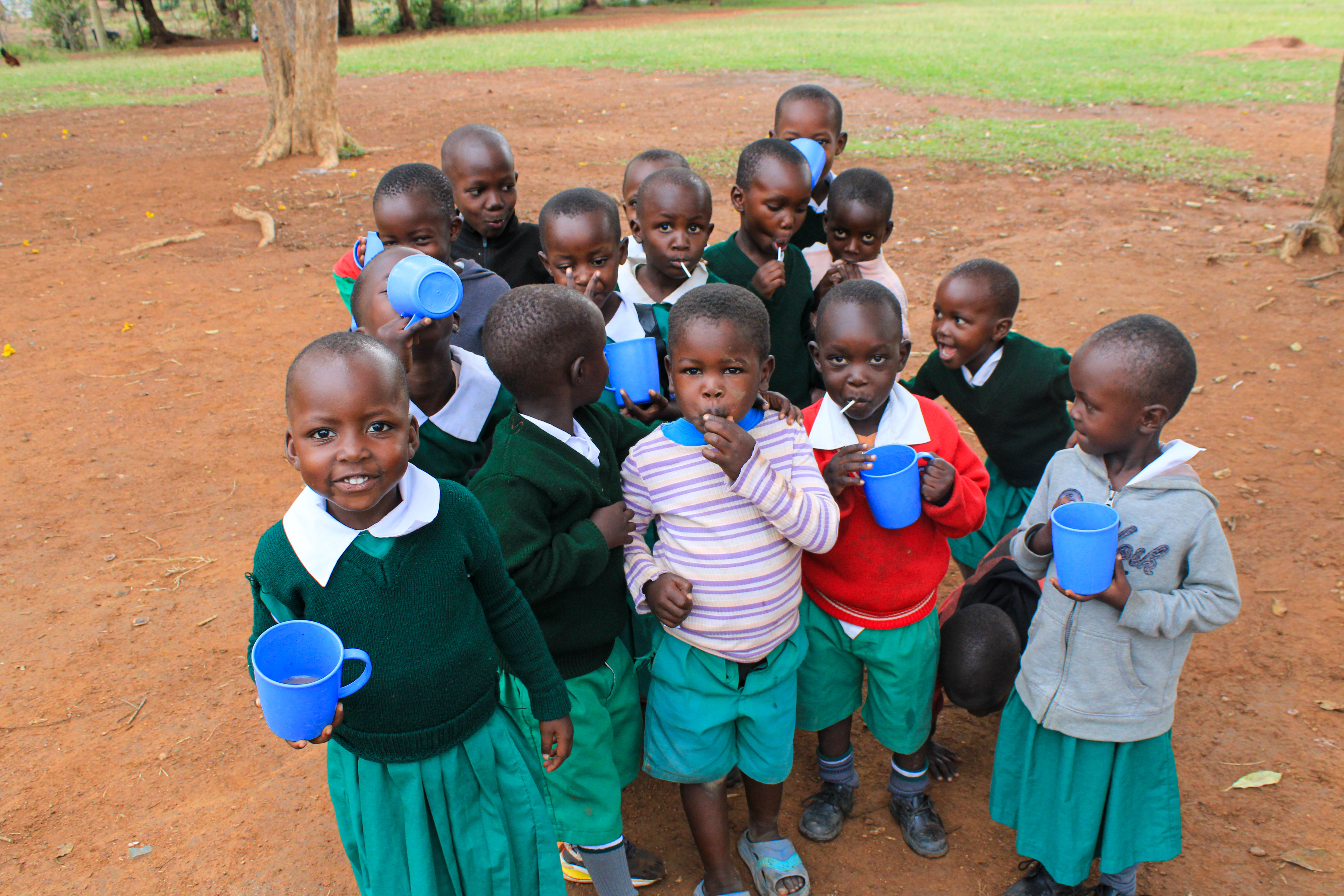 Pupils at Angiro Comprehensive School receiving porridge
